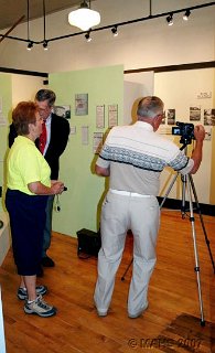 John Stenbroten and Carol Strause setting up the video equipment